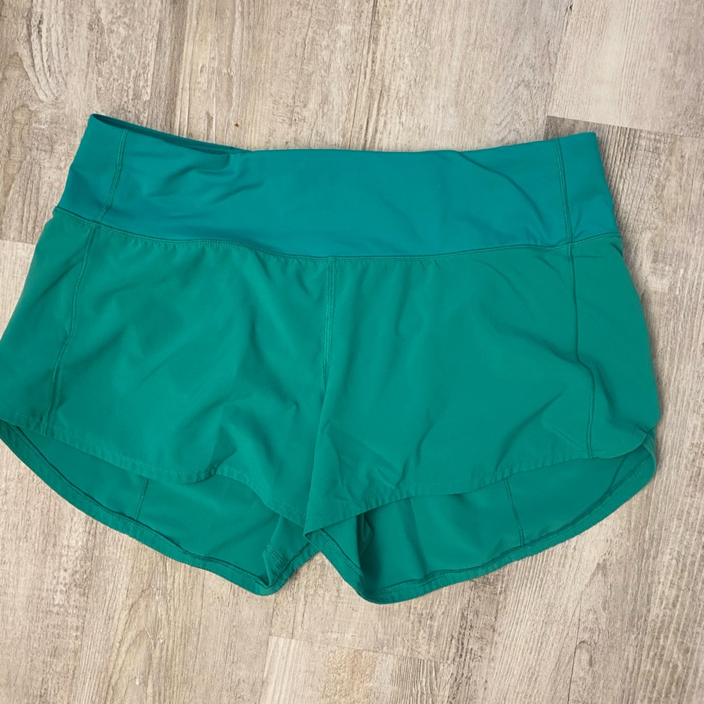 Lululemon Speed Up Shorts, 4” size 8
